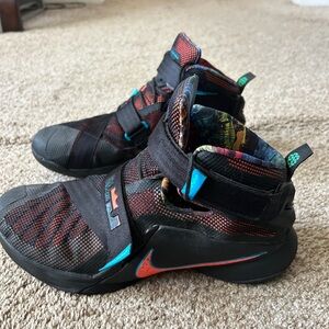 Nike Black and Orange High-Top Sneakers